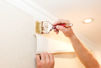 Pose de papier peint à la Framboisière — revêtements muraux et toiles de verre